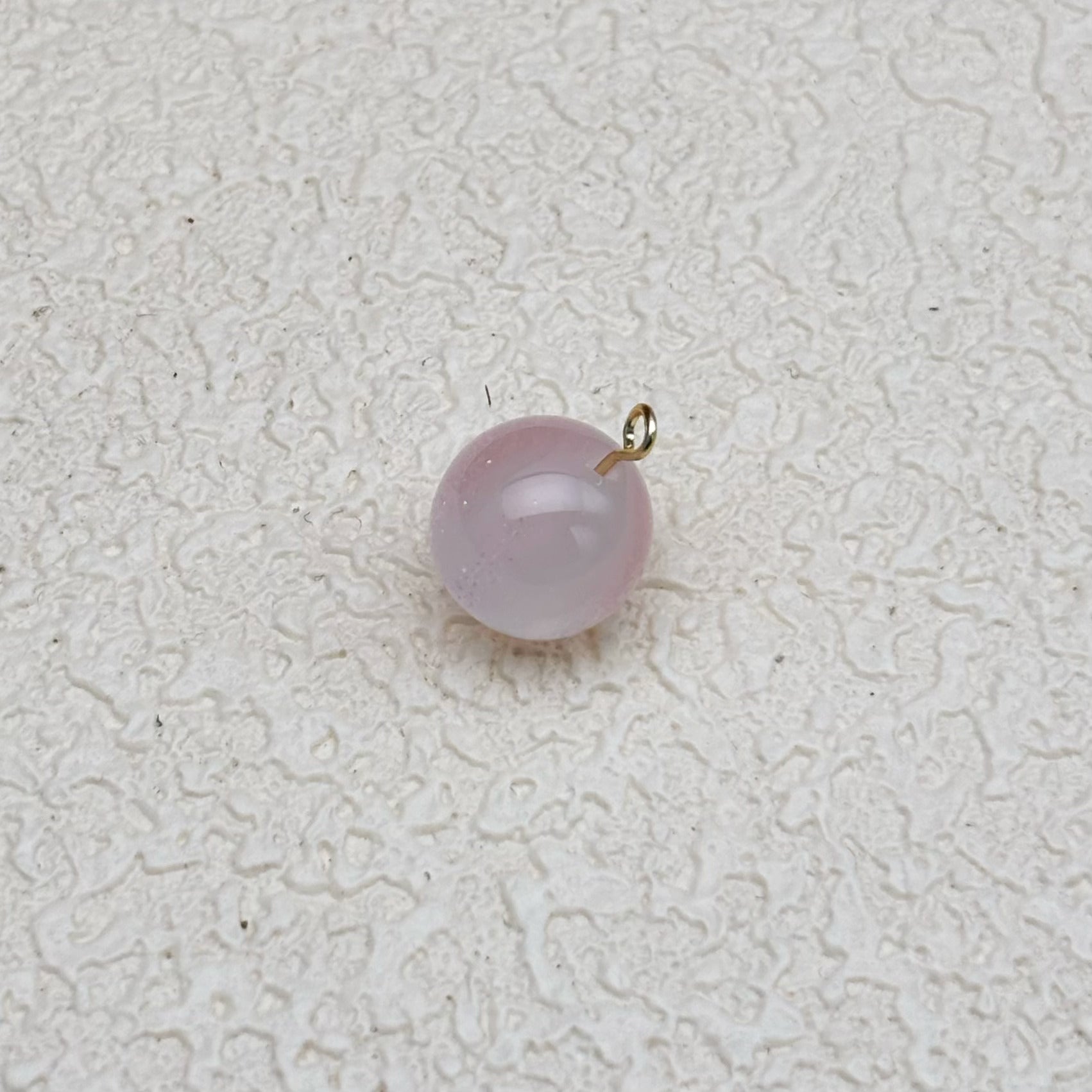 12mm | 紫外線で色が変わるビーズ（ピンク→ラベンダー柄）