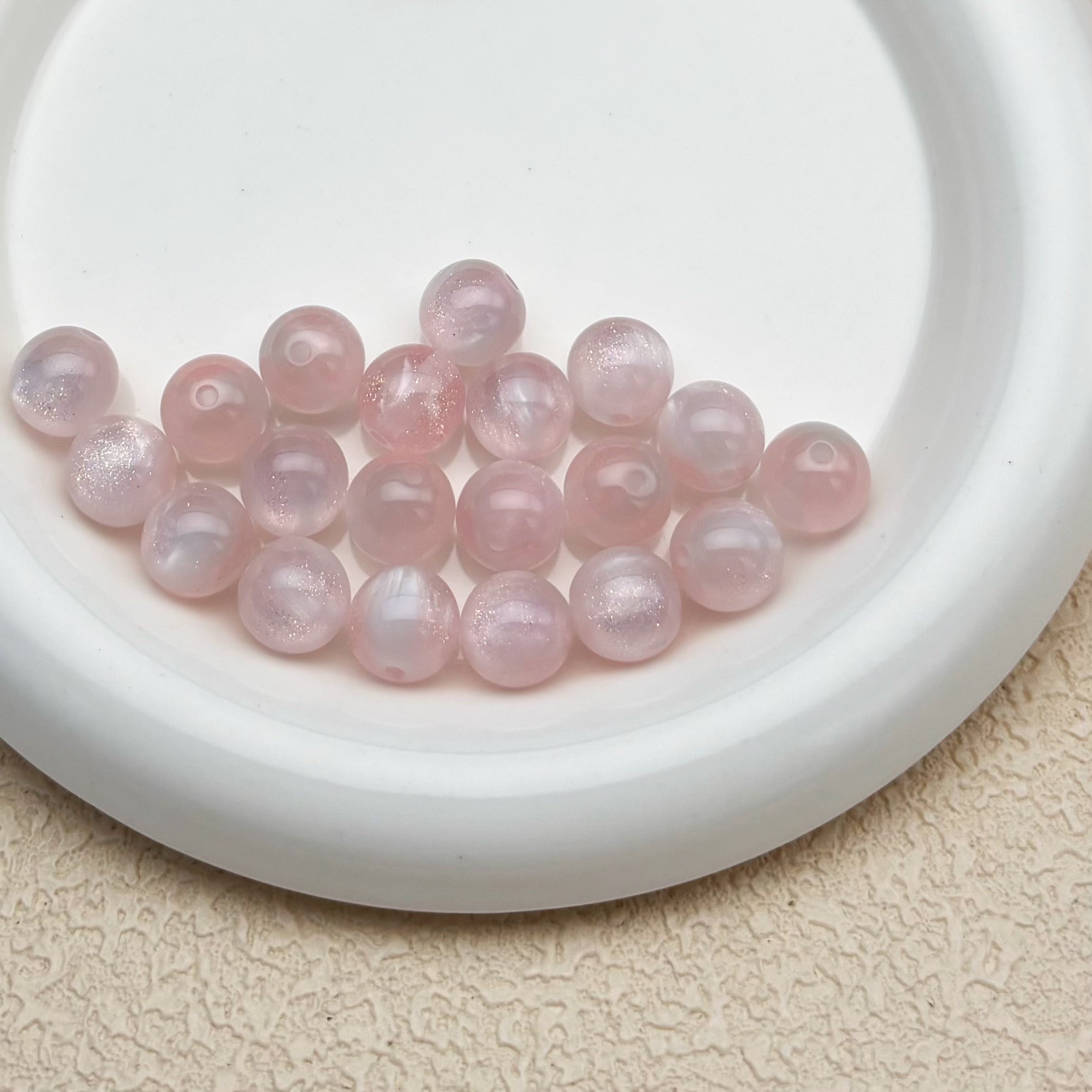 12mm | 紫外線で色が変わるビーズ（ピンク→ラベンダー柄）