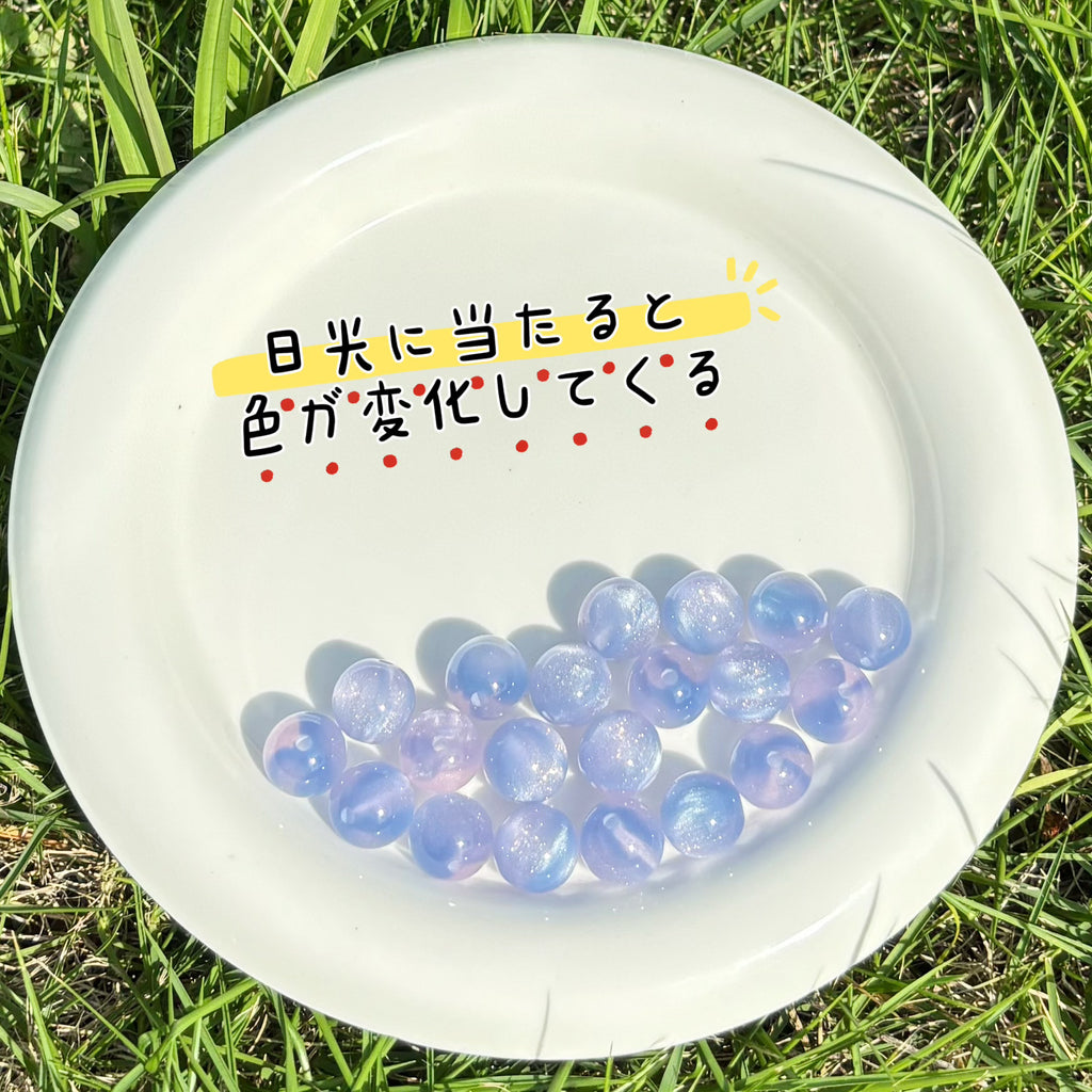 12mm | 紫外線で色が変わるビーズ（ピンク→ラベンダー柄）