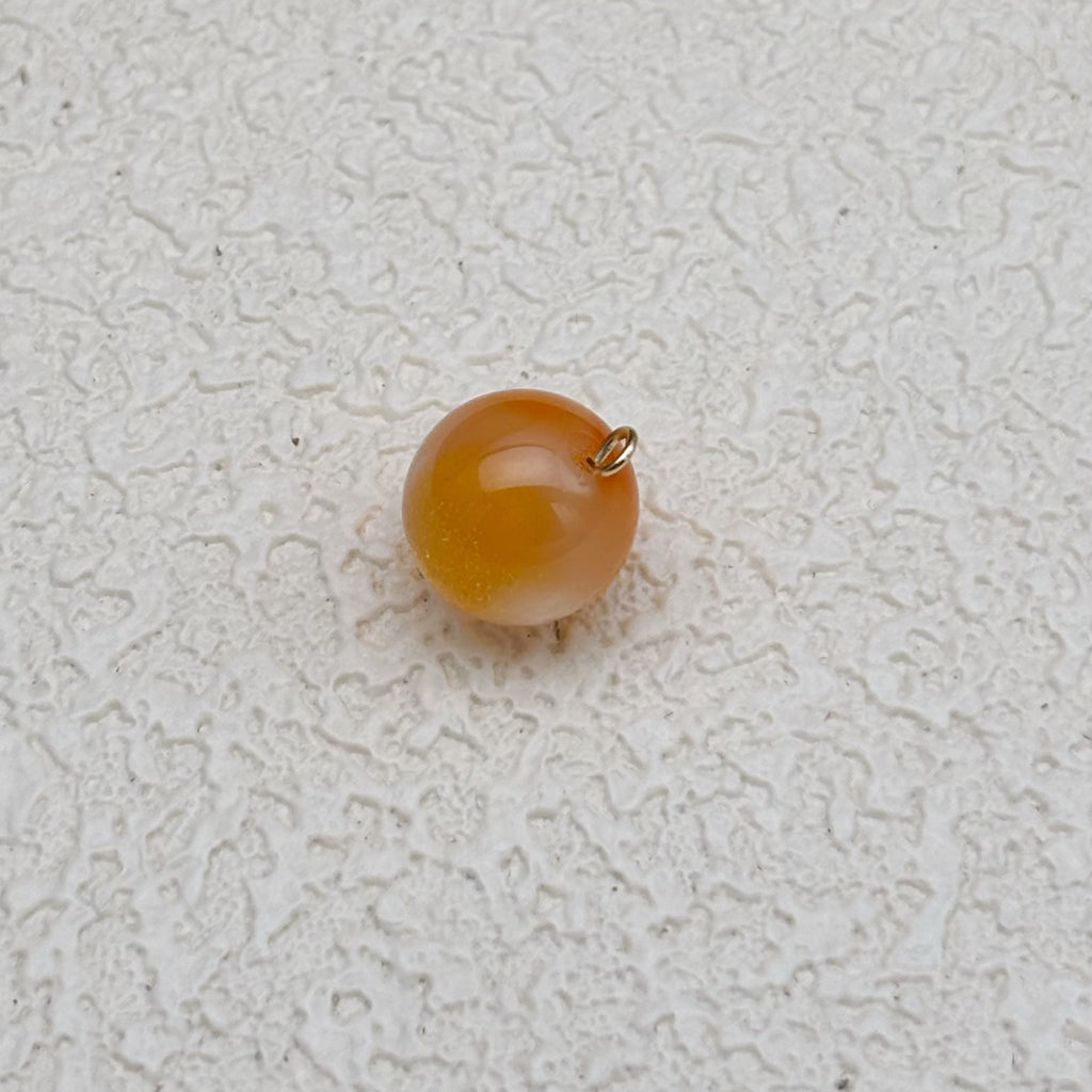 12mm | 紫外線で色が変わるビーズ（オレンジ→スモークブルー柄）