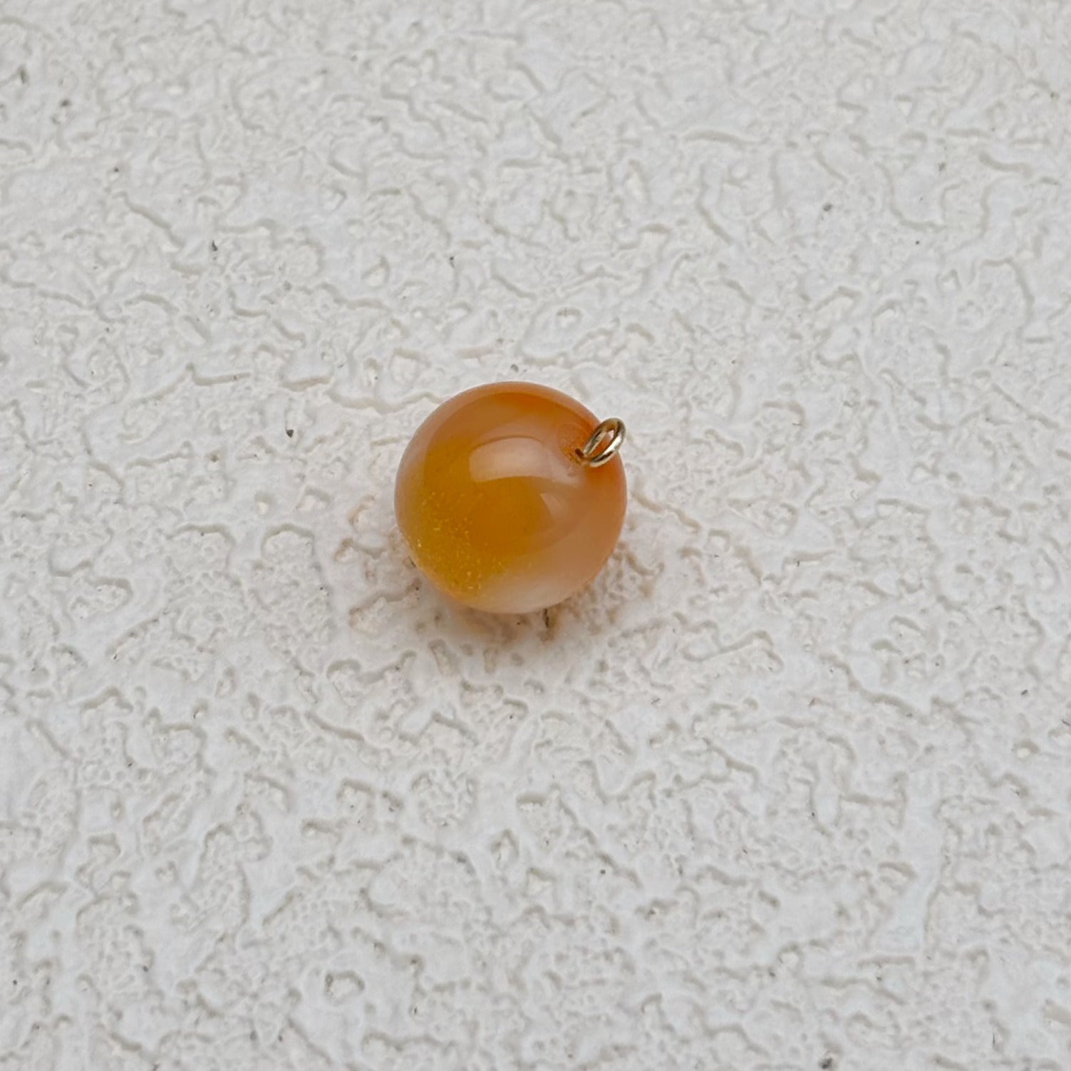 12mm | 紫外線で色が変わるビーズ（オレンジ→スモークブルー柄）