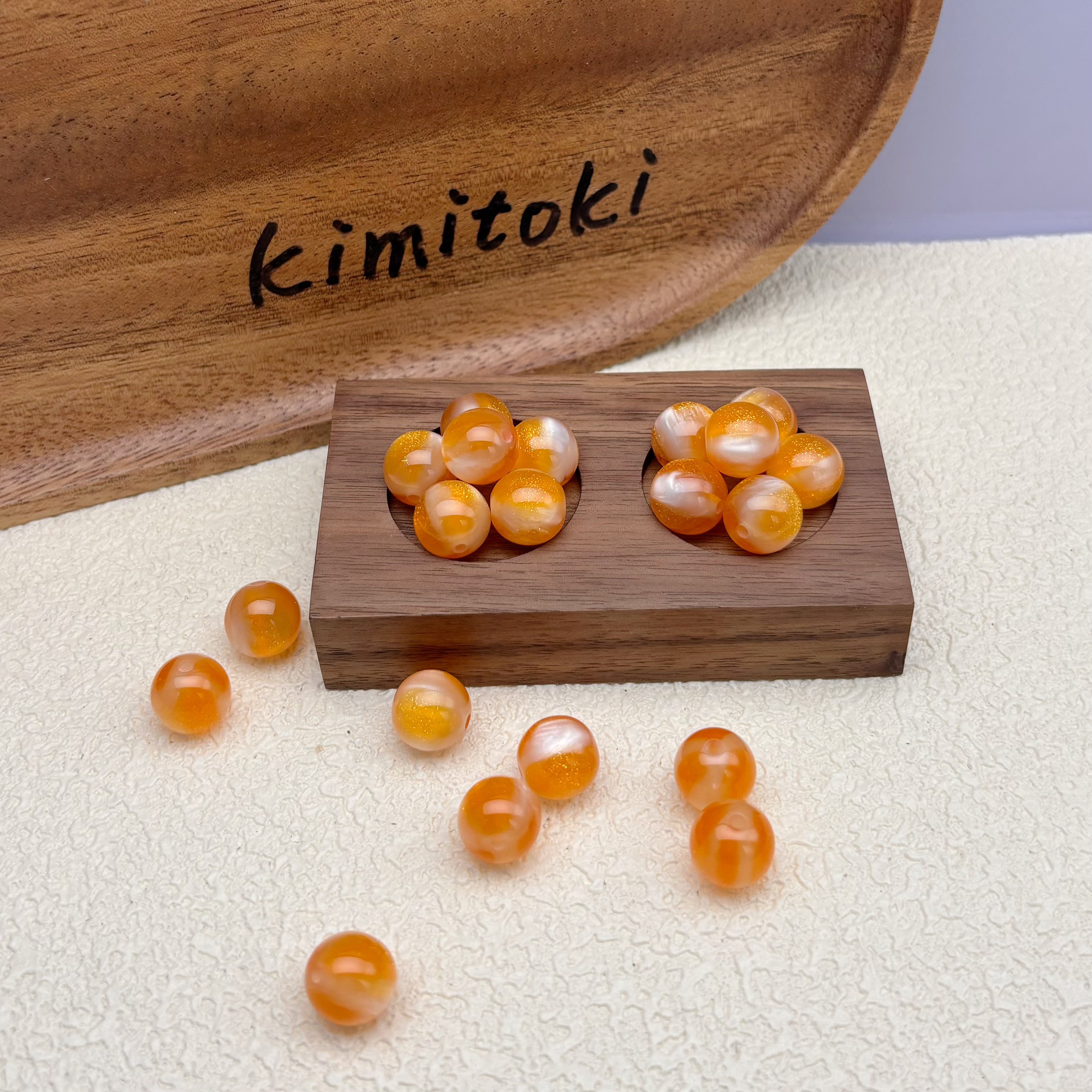 12mm | 紫外線で色が変わるビーズ（オレンジ→スモークブルー柄）