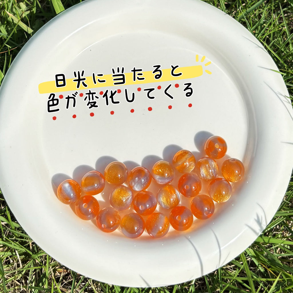 12mm | 紫外線で色が変わるビーズ（オレンジ→スモークブルー柄）