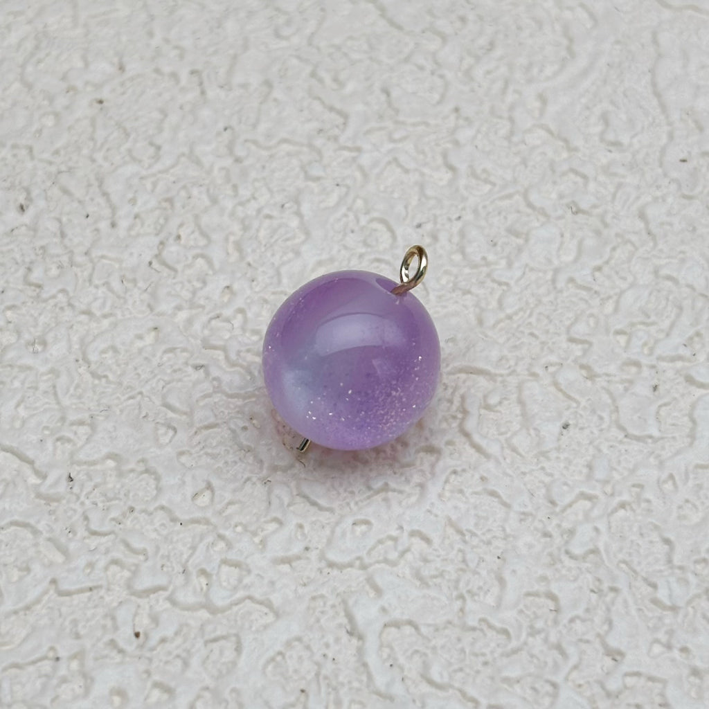 12mm | 紫外線で色が変わるビーズ（ラベンダー→ピンク柄）