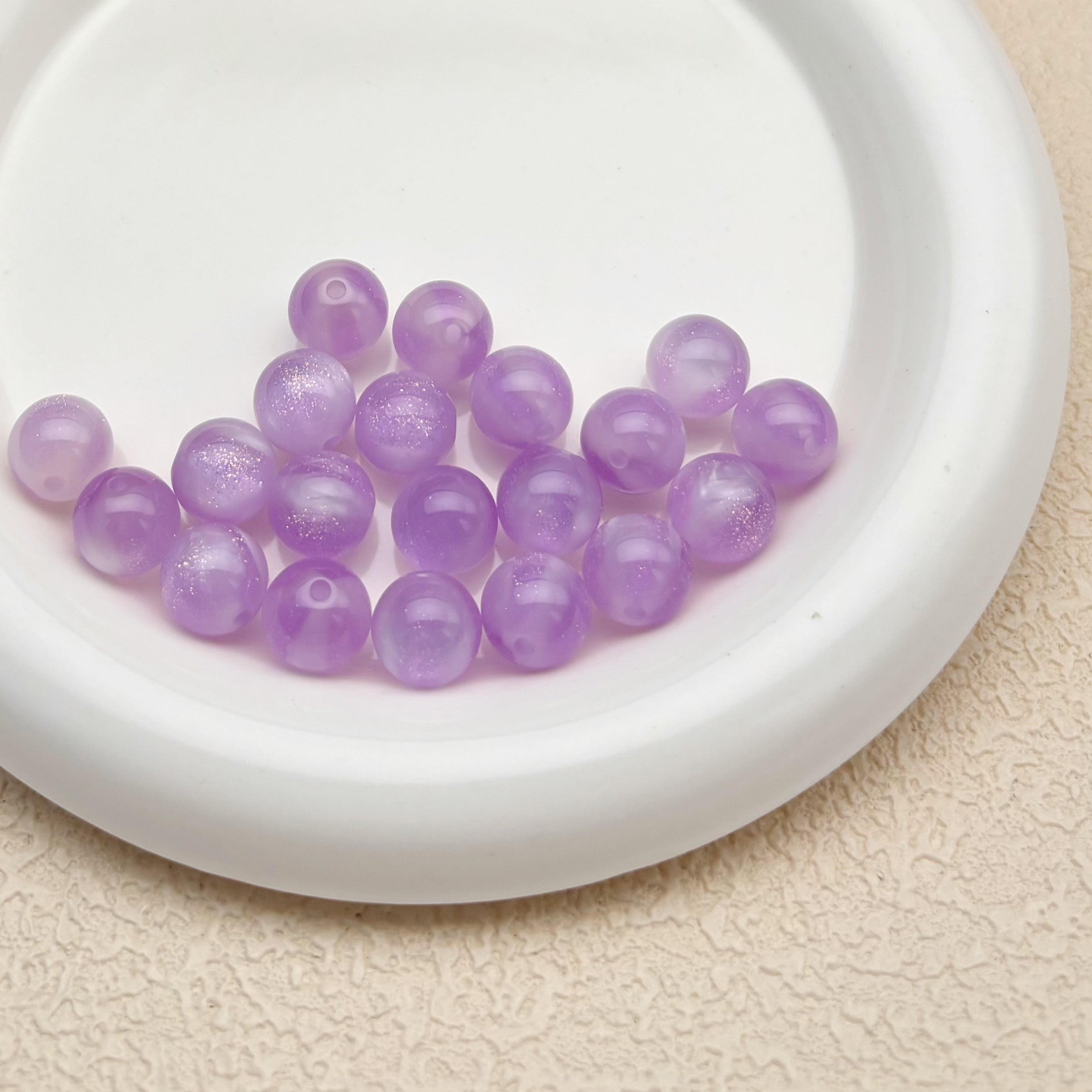 12mm | 紫外線で色が変わるビーズ（ラベンダー→ピンク柄）