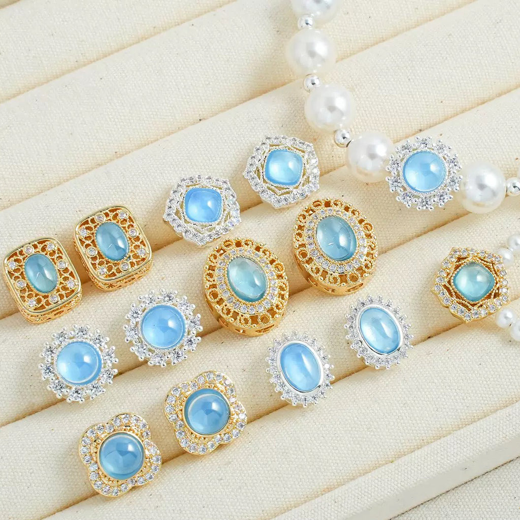 人工アクアマリンの楕円チャーム（ペンダント／スペーサービーズ）