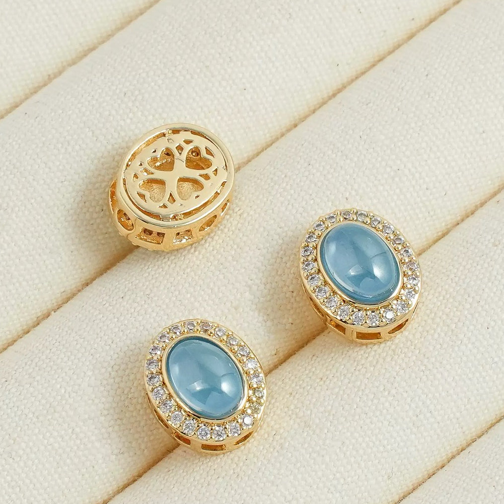 人工アクアマリンの丸型チャーム（ペンダント／スペーサービーズ）