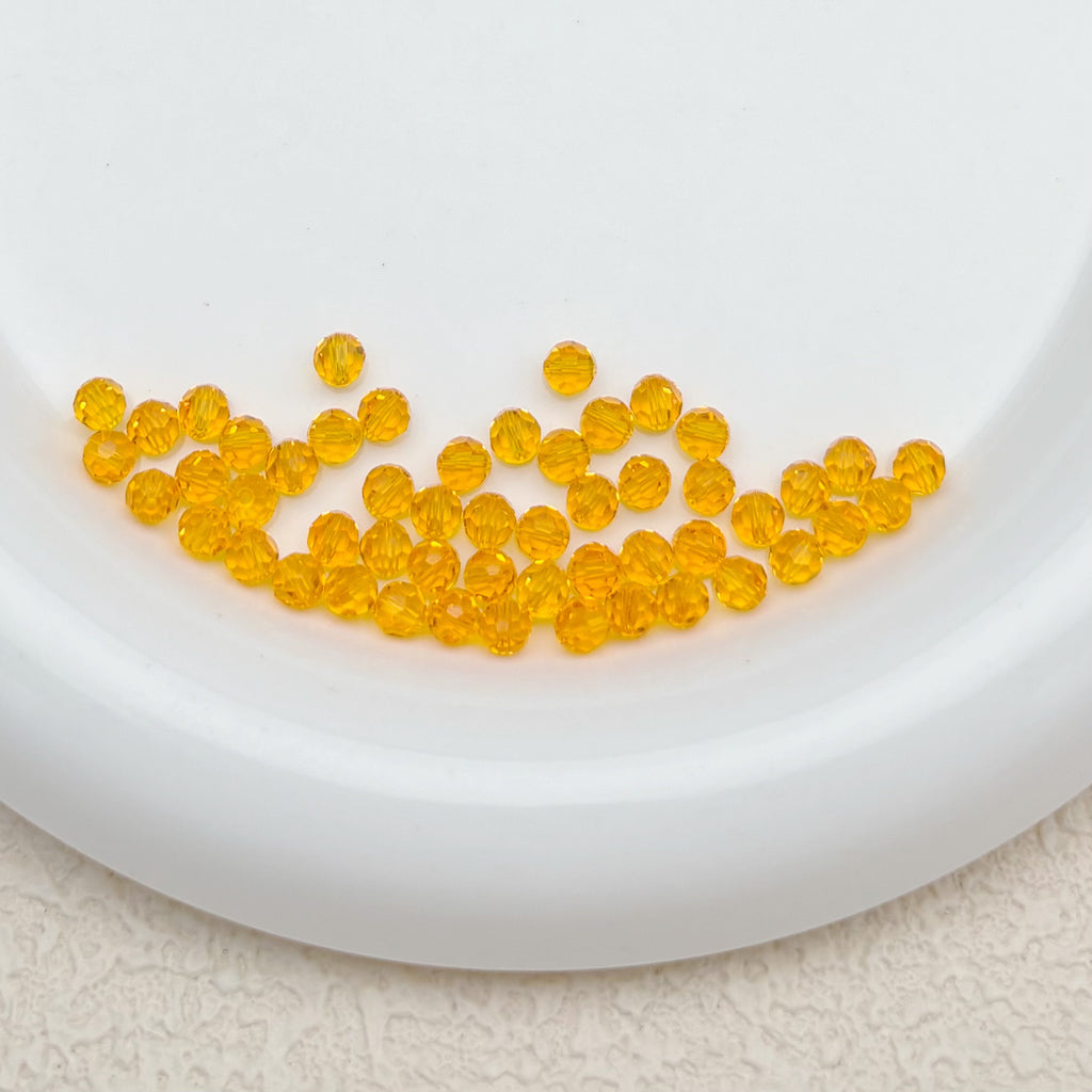 4mm | オレンジスワロ風クリスタルガラスビーズ