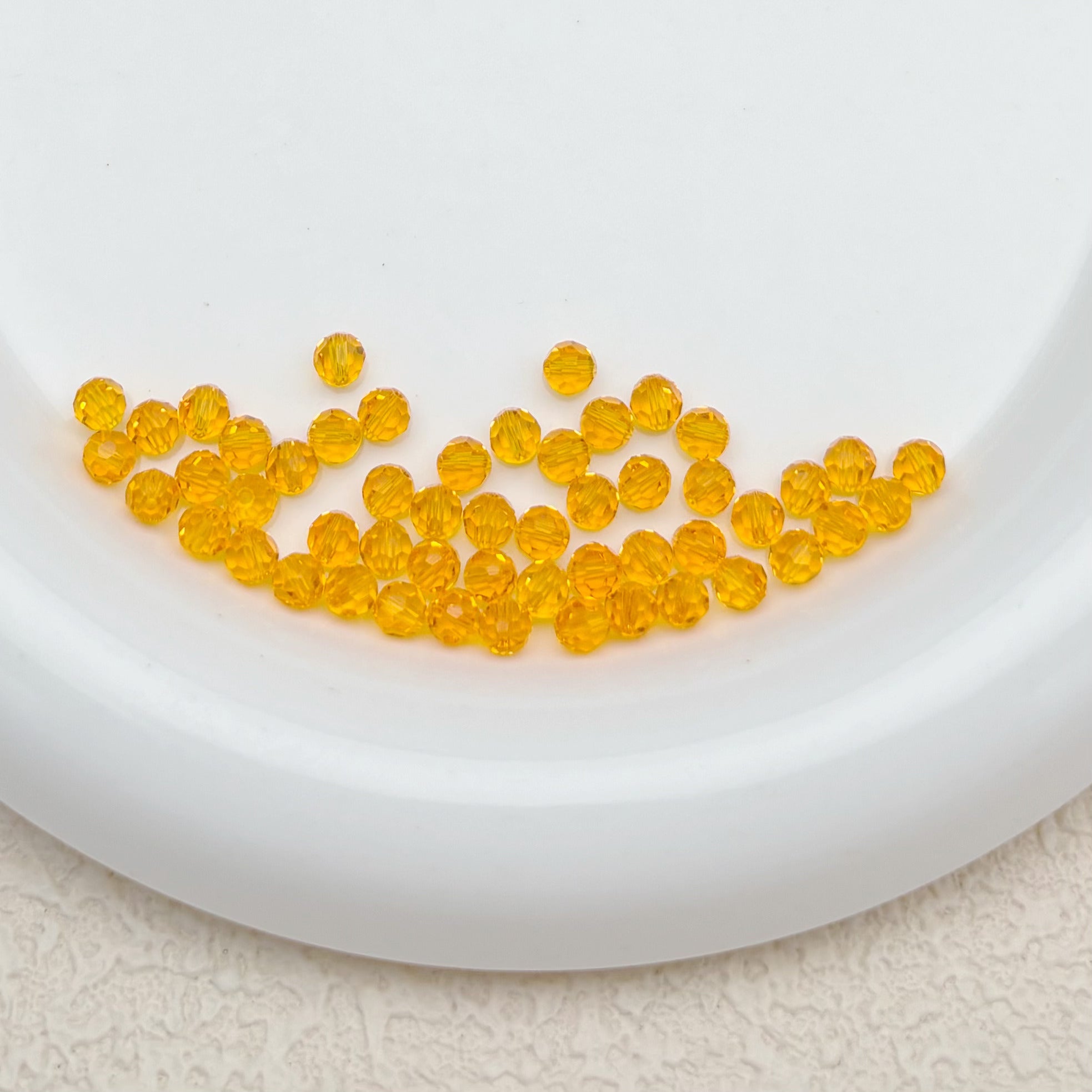 4mm | オレンジスワロ風クリスタルガラスビーズ