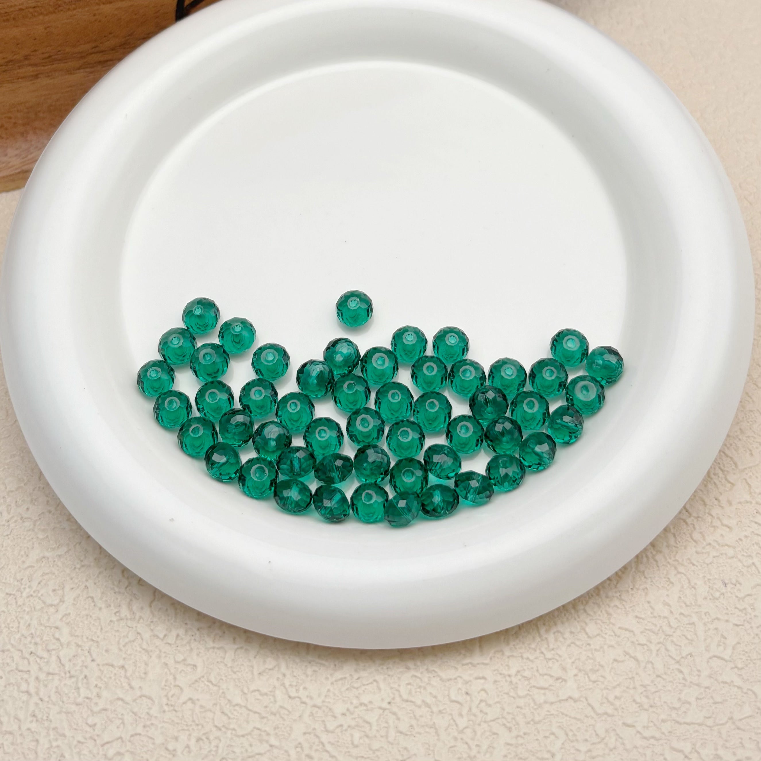 8mm | レイクグリーンスワロ風クリスタルガラスロンデルビーズ