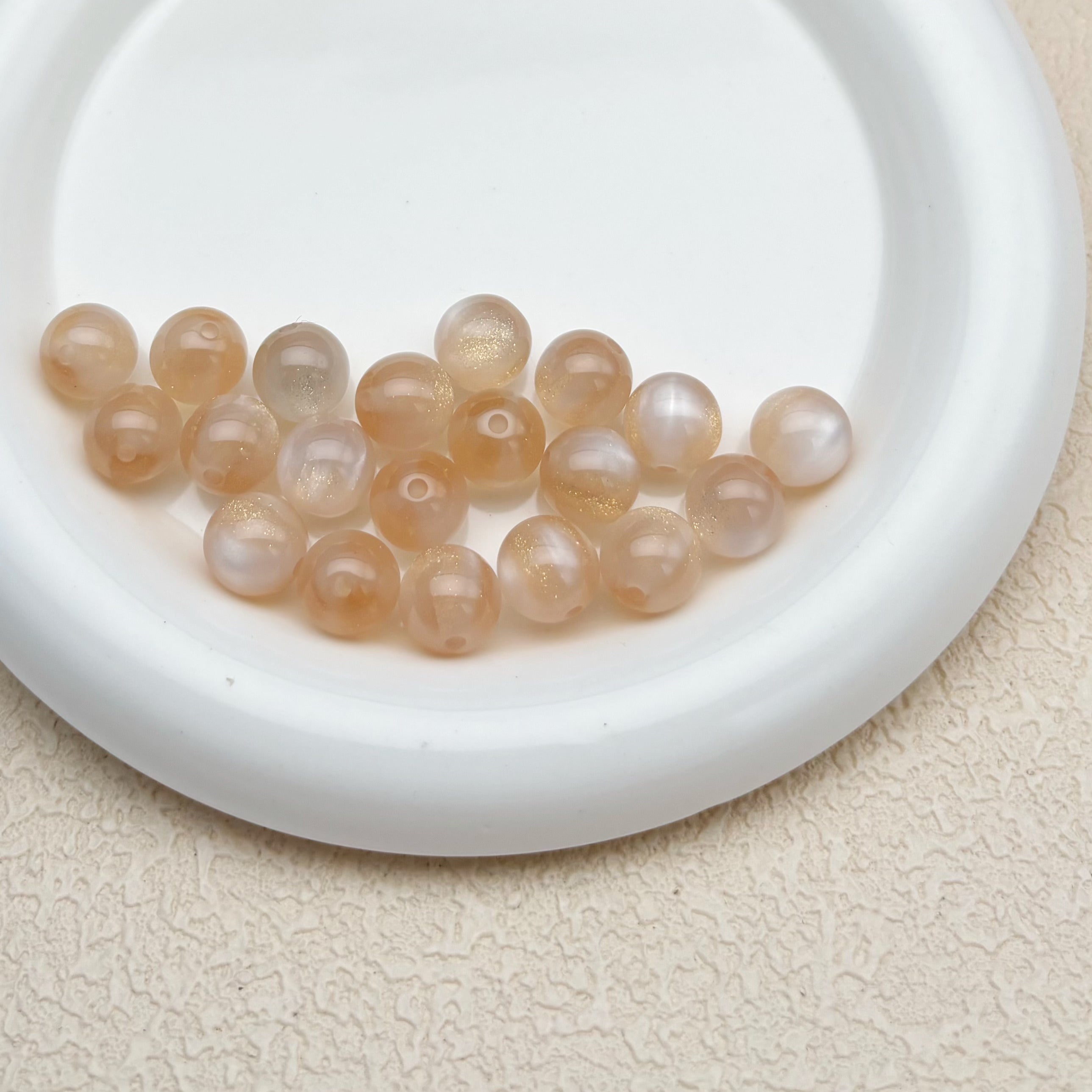 12mm | 紫外線で色が変わるビーズ（ベージュ→ラベンダー柄）