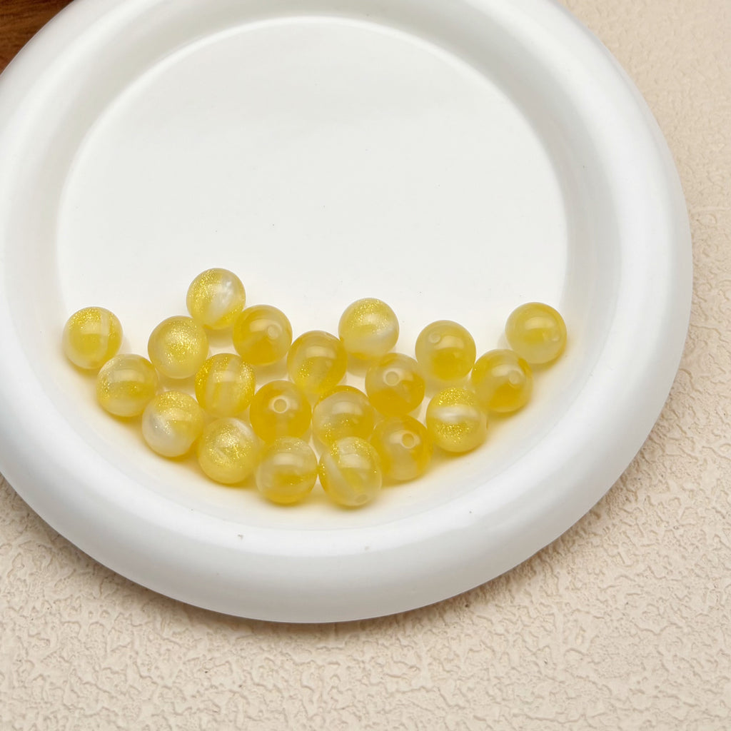 12mm | 紫外線で色が変わるビーズ（イエロー→グレーブルー柄）