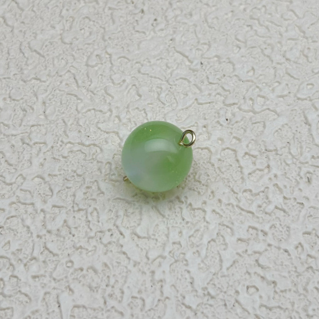 12mm | 紫外線で色が変わるビーズ（ミントグリーン→ラベンダー柄）