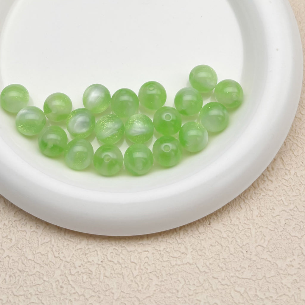 12mm | 紫外線で色が変わるビーズ（ミントグリーン→ラベンダー柄）