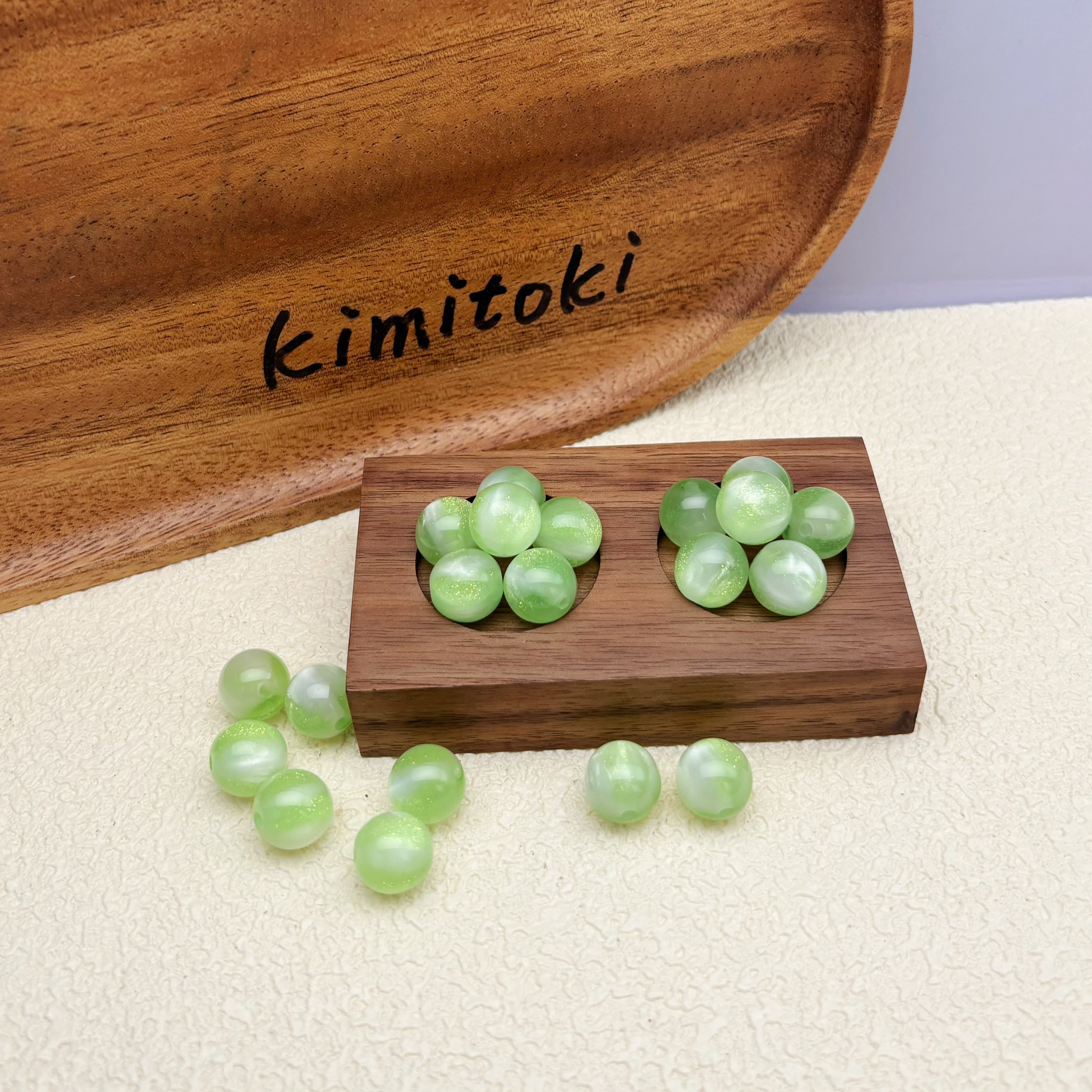 12mm | 紫外線で色が変わるビーズ（ミントグリーン→ラベンダー柄）