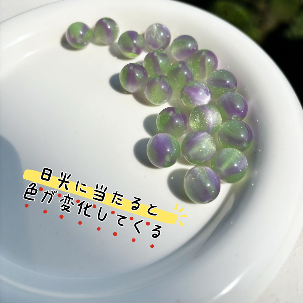 12mm | 紫外線で色が変わるビーズ（ミントグリーン→ラベンダー柄）