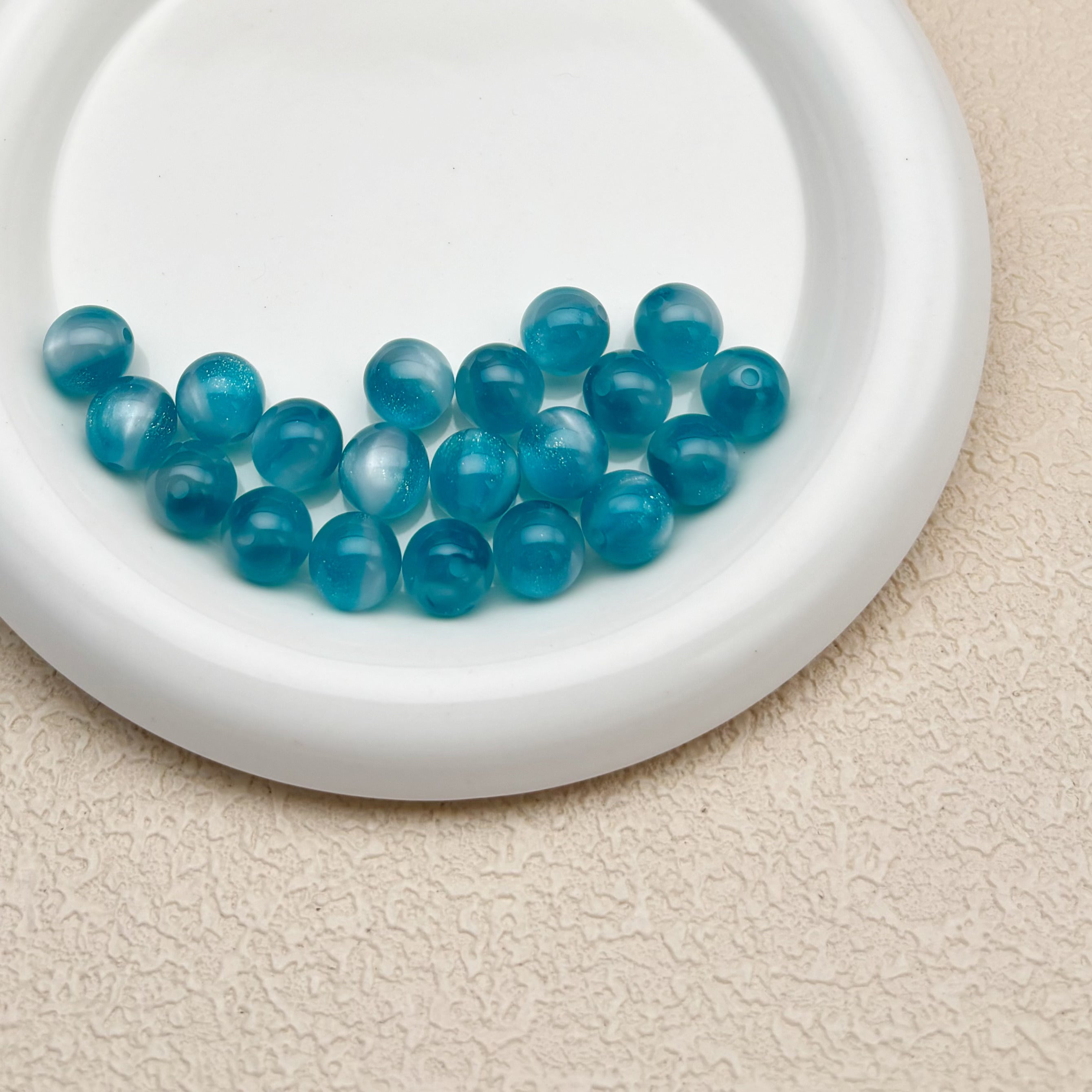 12mm | 紫外線で色が変わるビーズ（アクアブルー→ラベンダー柄）