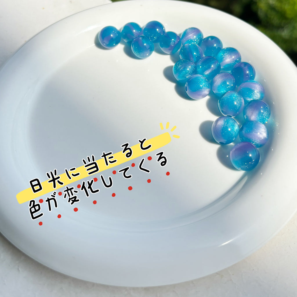 12mm | 紫外線で色が変わるビーズ（アクアブルー→ラベンダー柄）