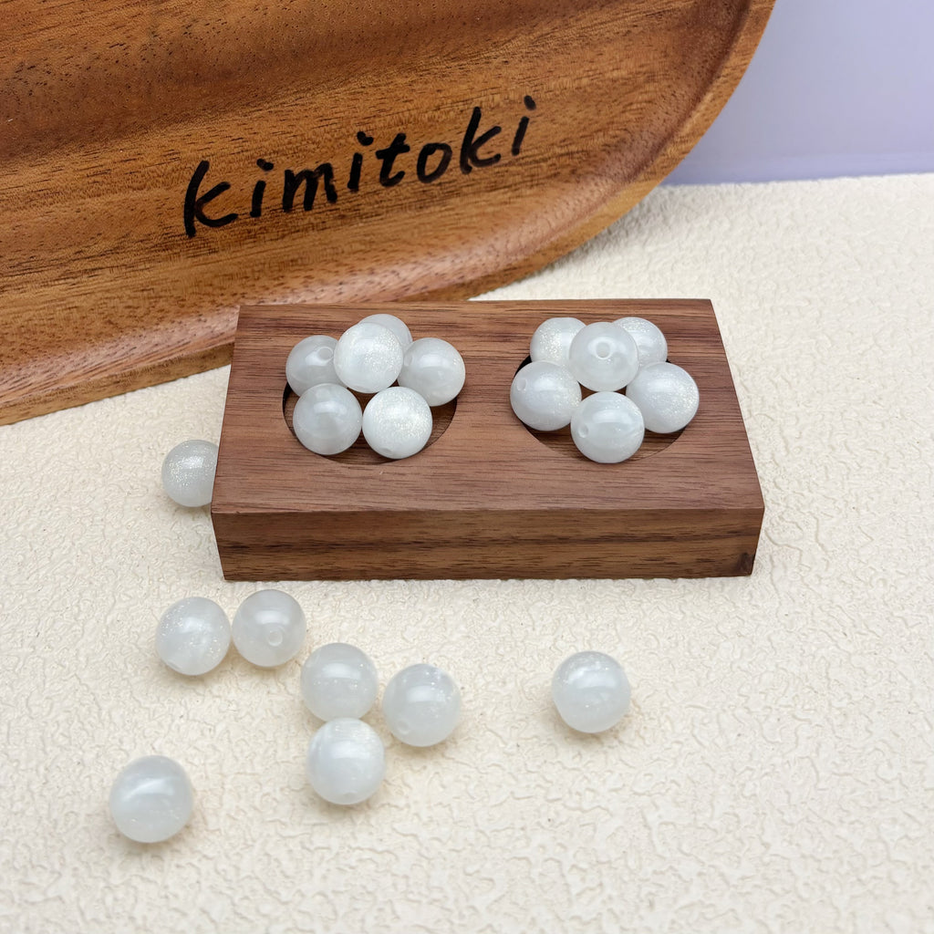 12mm | 紫外線で色が変わるビーズ（ホワイト→スモークブルー柄）