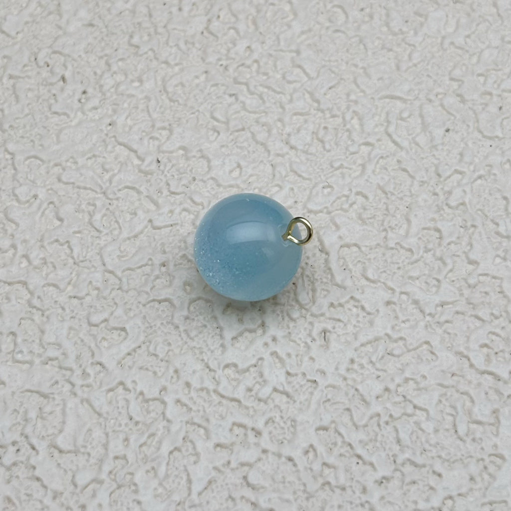 12mm | 紫外線で色が変わるビーズ（スモークブルー→ピンク柄）