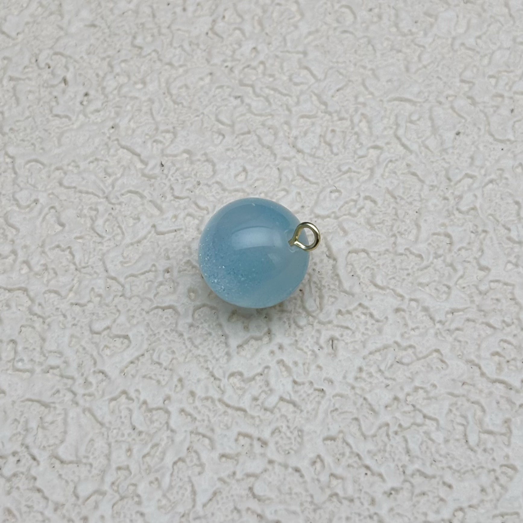 12mm | 紫外線で色が変わるビーズ（スモークブルー→ピンク柄）