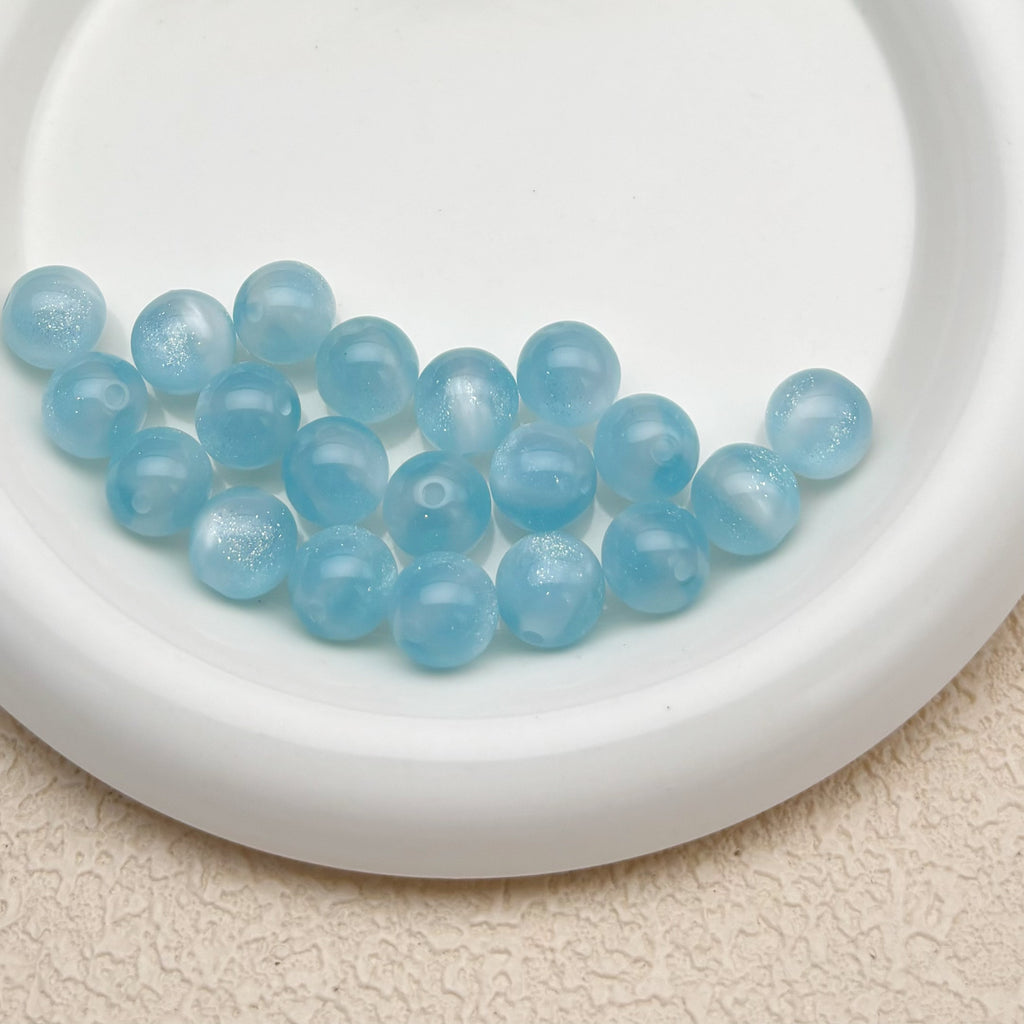 12mm | 紫外線で色が変わるビーズ（スモークブルー→ピンク柄）