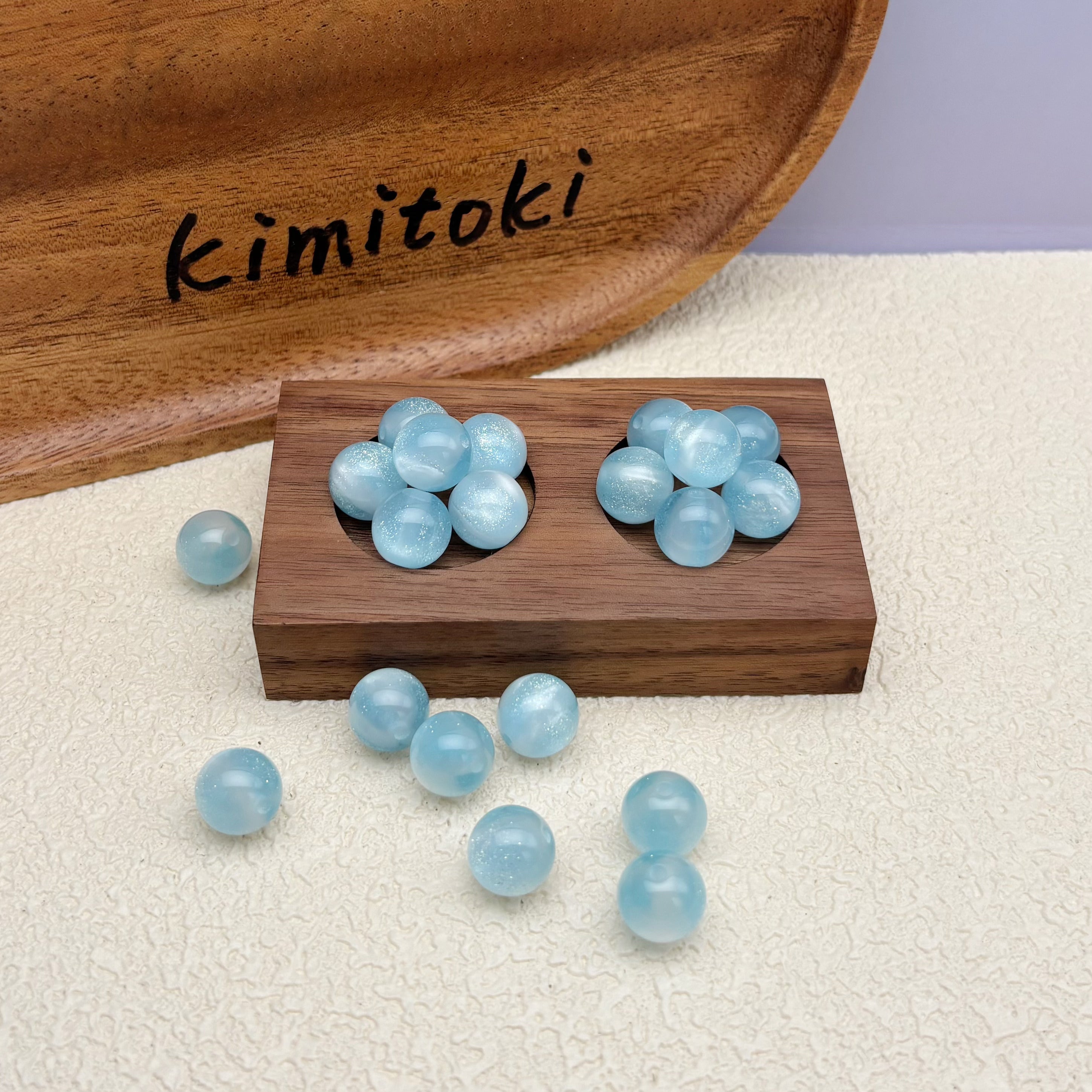 12mm | 紫外線で色が変わるビーズ（スモークブルー→ピンク柄）