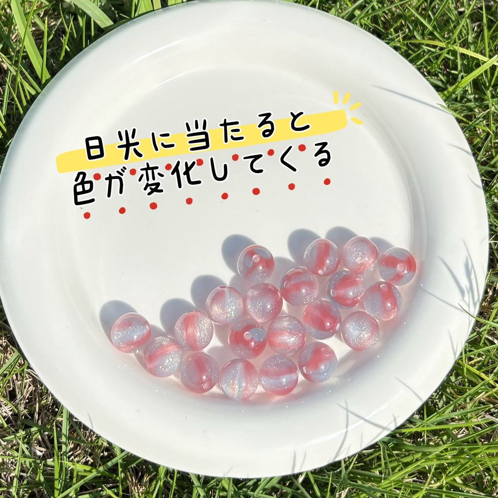 12mm | 紫外線で色が変わるビーズ（スモークブルー→ピンク柄）