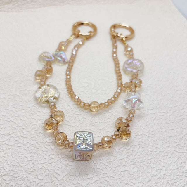 シャンパンゴールドのガラスビーズ・エレガントスマホストラップ